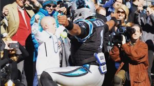 http://myfox8.com/2015/11/09/danville-boy-who-recently-lost-father-gets-touchdown-ball-from-cam-newton-during-packers-game/